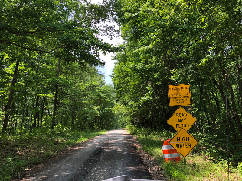 These are the warnings at the start of the road that the brave couple in the massive luxury SUV took.